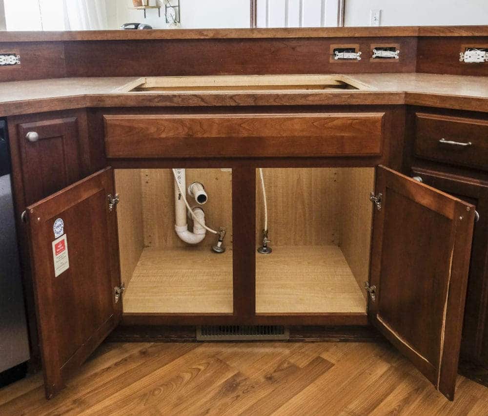 Kitchen sink cabinets with divider.